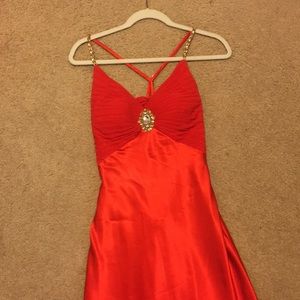 Gorgeous Red Cache gown.